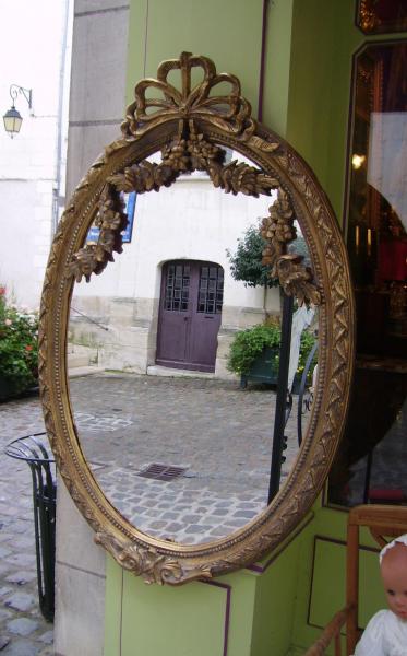 Miroir ovale à fronton Louis XVI-photo1